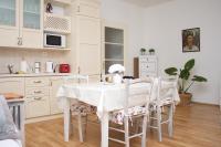 Kuchyňa alebo kuchynka v ubytovaní Apartman Allegria