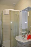 Łazienka w obiekcie Gyopár Gyöngye Apartmanház