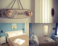 Posteľ alebo postele v izbe v ubytovaní B&B La Rosa dei Venti