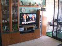 TV a/nebo společenská místnost v ubytování Apartamentos Santabarbara