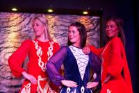 three women standing next to each other on a stage at Arlington Hotel O'Connell Bridge in Dublin
