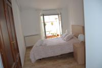 Posteľ alebo postele v izbe v ubytovaní Apartments Figueres
