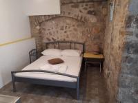 Posteľ alebo postele v izbe v ubytovaní Hostel Omiš