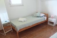 Posteľ alebo postele v izbe v ubytovaní Maria's Paradise