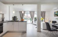Kuchyňa alebo kuchynka v ubytovaní Modern Apartman Pjero