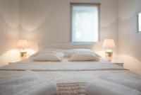 Posteľ alebo postele v izbe v ubytovaní Modern Apartman Pjero