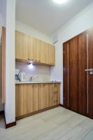 Kuchyňa alebo kuchynka v ubytovaní Apartamenty na Wyspie - Aquamarina - Budynek A - B - C