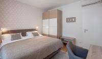 Posteľ alebo postele v izbe v ubytovaní Apartments N10 Zagreb