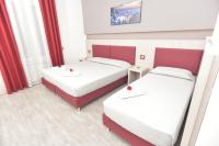 Posteľ alebo postele v izbe v ubytovaní Eden Rooms