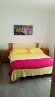 Postel nebo postele na pokoji v ubytování Apartments J&K