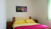 Postel nebo postele na pokoji v ubytování Apartments J&K