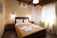 Postel nebo postele na pokoji v ubytování PRIVATE Sapphiros Villa
