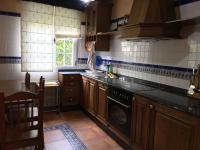 A kitchen or kitchenette at Os Arroxos