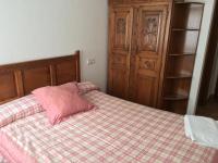 A bed or beds in a room at Os Arroxos