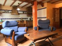 A seating area at Os Arroxos