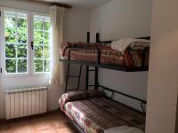 A bed or beds in a room at Os Arroxos