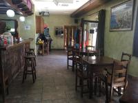 A restaurant or other place to eat at Os Arroxos
