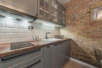 Kuchyň nebo kuchyňský kout v ubytování Apartments Fontana