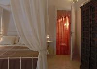 A bed or beds in a room at Dimore Santagaeta