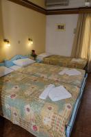 Alkion Hotelにあるベッド