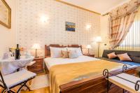 Postel nebo postele na pokoji v ubytování Villas Arbia - Margita Beach hotel
