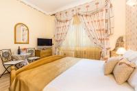 Postel nebo postele na pokoji v ubytování Villas Arbia - Margita Beach hotel