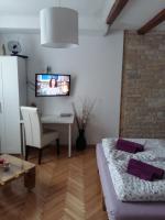 Posteľ alebo postele v izbe v ubytovaní Apartmani Stonewood