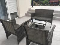 A seating area at Enjoyit Rooms