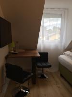 A television and/or entertainment centre at Enjoyit Rooms