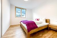 Łóżko lub łóżka w pokoju w obiekcie Gartenappartment de Luxe by A-Appartments