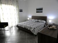 A bed or beds in a room at Appartamento Celeste