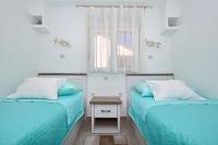 Postel nebo postele na pokoji v ubytování Apartment Nela