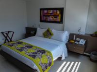 Hotel Golden Palermoにあるベッド