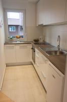 Kuchyňa alebo kuchynka v ubytovaní Paula Apartment