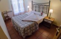 Postel nebo postele na pokoji v ubytování Casa El Puente