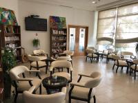 Posezení v ubytování Hotel AL KARMEL
