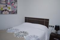 Posteľ alebo postele v izbe v ubytovaní Apartamento Prado - Casa Eva