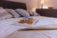 Posteľ alebo postele v izbe v ubytovaní Apartment Varga
