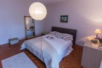 Posteľ alebo postele v izbe v ubytovaní Apartment Varga