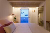 A bed or beds in a room at Hotel S'Estil-let