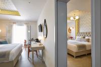 Postel nebo postele na pokoji v ubytování De Sol Hotel & Spa