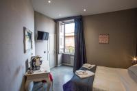 A bed or beds in a room at Roma 2B