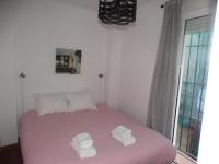 Posteľ alebo postele v izbe v ubytovaní Málaga Apartamentos - Pozos Dulces, 22