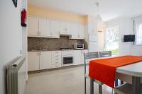 Kuchyň nebo kuchyňský kout v ubytování Apartamento Playa De Lariño