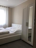 Posteľ alebo postele v izbe v ubytovaní Dado Apartments
