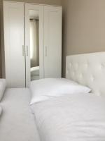 Posteľ alebo postele v izbe v ubytovaní Dado Apartments