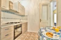 Kuchyňa alebo kuchynka v ubytovaní Boutique Apartman Villa Mediteran
