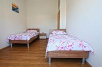 Postel nebo postele na pokoji v ubytování Apartments Ukic