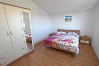 Postel nebo postele na pokoji v ubytování Apartments Ukic