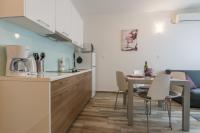 Kuchyňa alebo kuchynka v ubytovaní Melita Center Apartment
